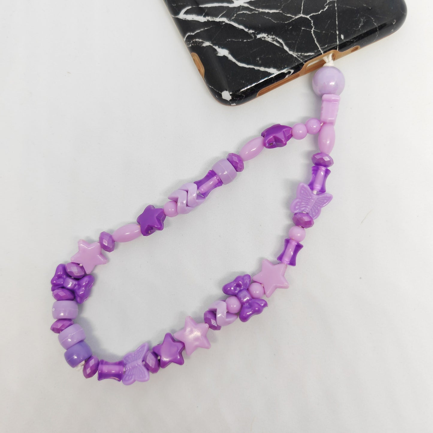 MALICIEUSE - grigri de téléphone (petit) - mauve