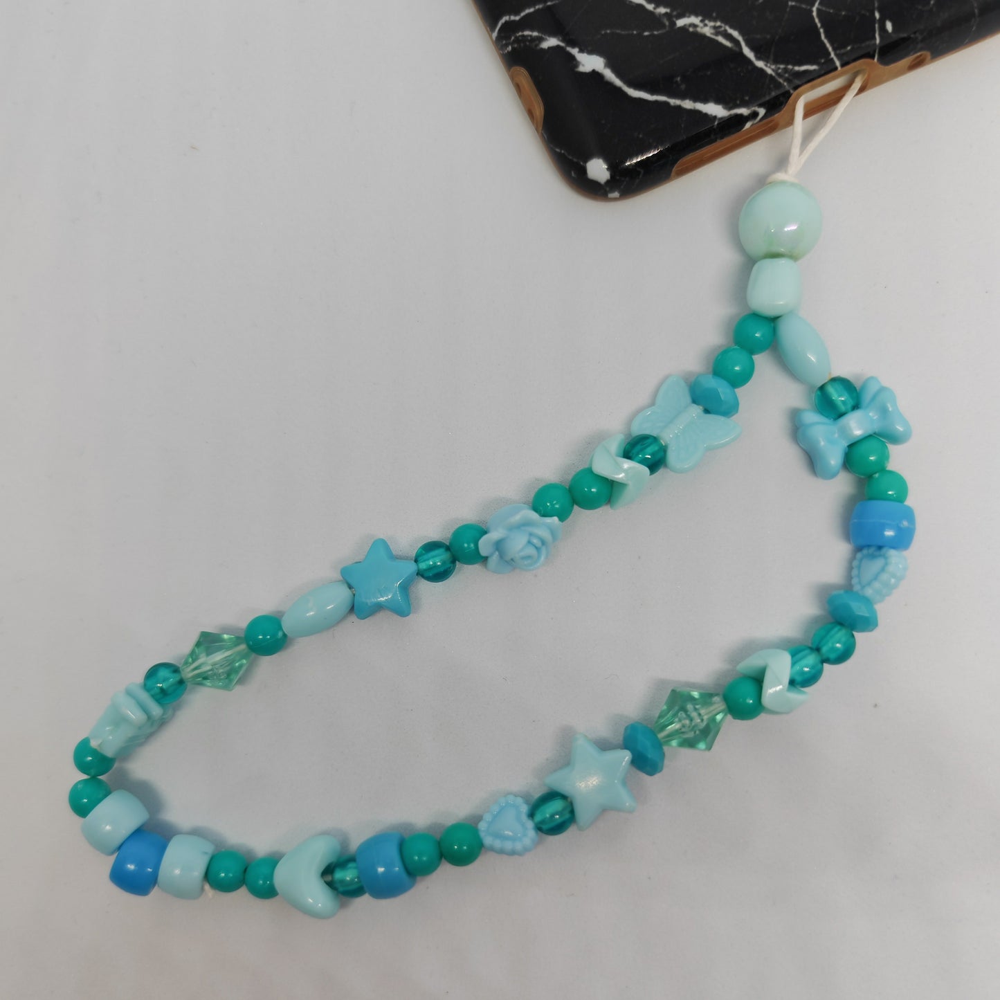 MALICIEUSE - grigri de téléphone (petit) - bleu