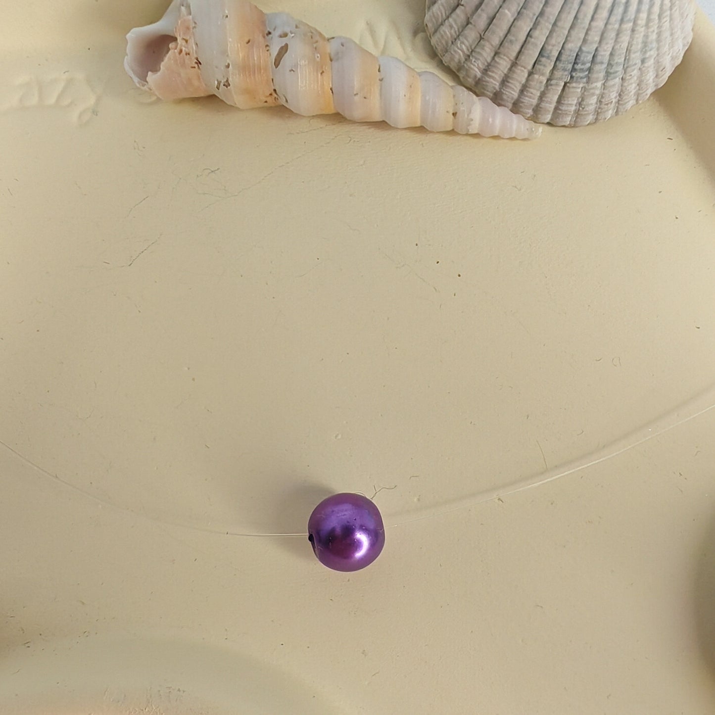 SINCÈRE - collier - perle sur fil transparent