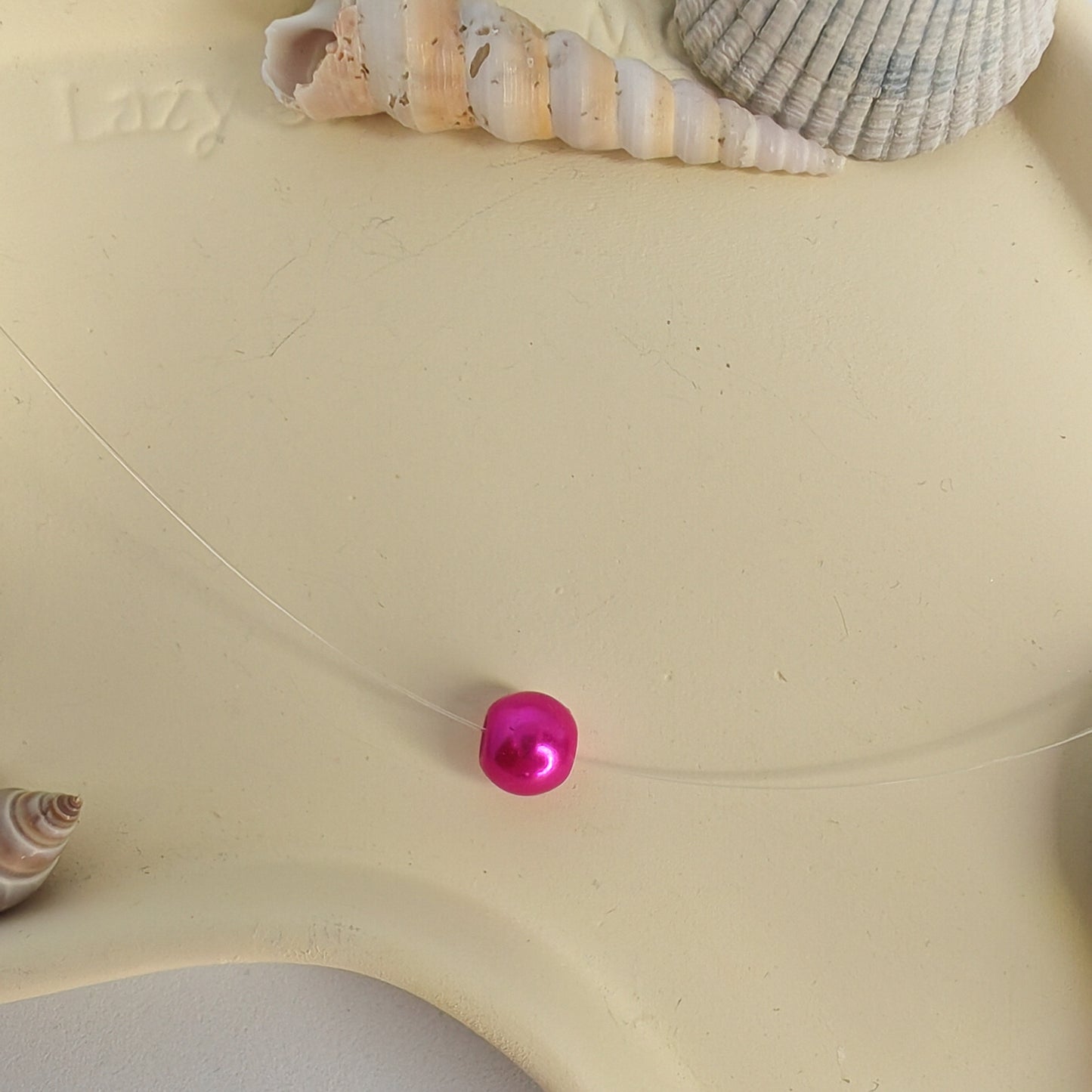 SINCÈRE - collier - perle sur fil transparent