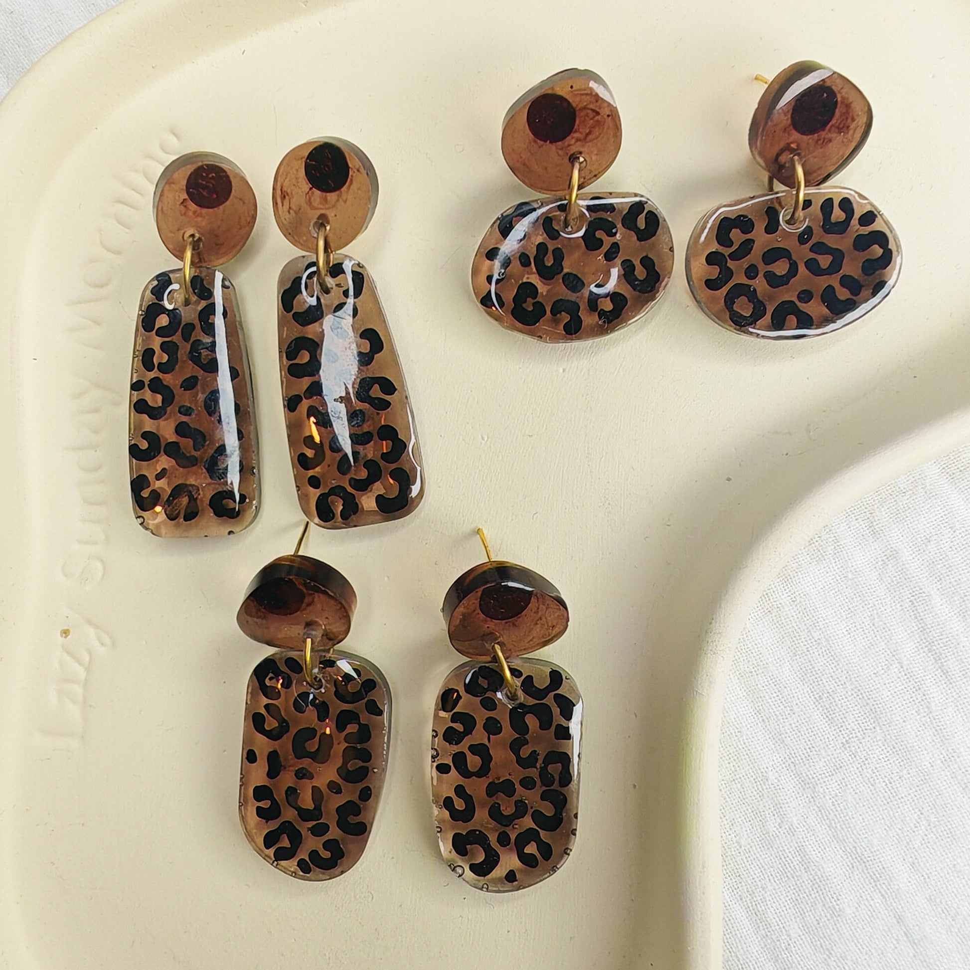 boucles d'oreilles motif leopard SAUVAGE